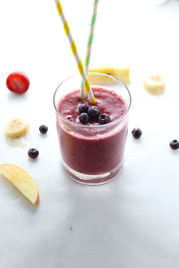this Blueberry Elixir Smoothie is packed with blueberries, apples, bananas and strawberries and blended with coconut water! perfect blend of nutritious and delicious! 