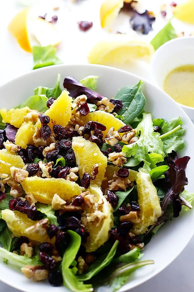 This Easy Walnut Cranberry Orange Salad is my new favorite! It is FULL of texture and drizzled with a sweet light dressing! Vegan + Gluten Free! 