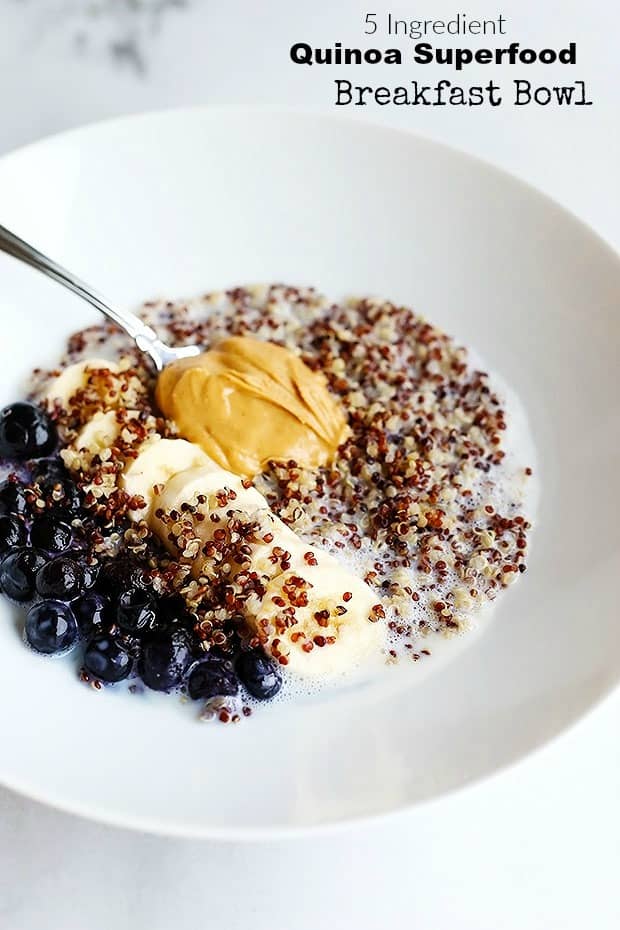 This 5 Ingredient Quinoa Superfood Breakfast Bowl is my new FAV snack! it's SO easy to prepare, only 5 ingredients and tastes amazing! blueberries, bananas, and Peanut Butter! Vegan and Gluten Free / TwoRaspberries.com