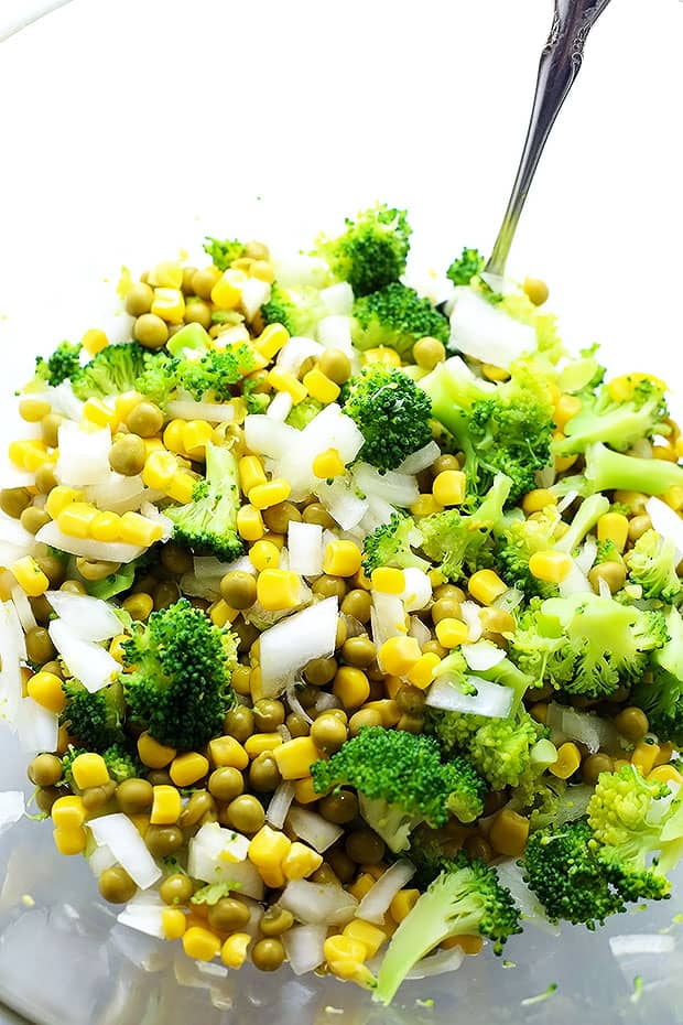 This Healthy Veggie Rice Bowl has corn, peas and broccoli mixed with brown rice over a bed of lettuce and a side of avocado! It is vegan and gluten free and perfect for a light healthy lunch. /TwoRaspberries.com