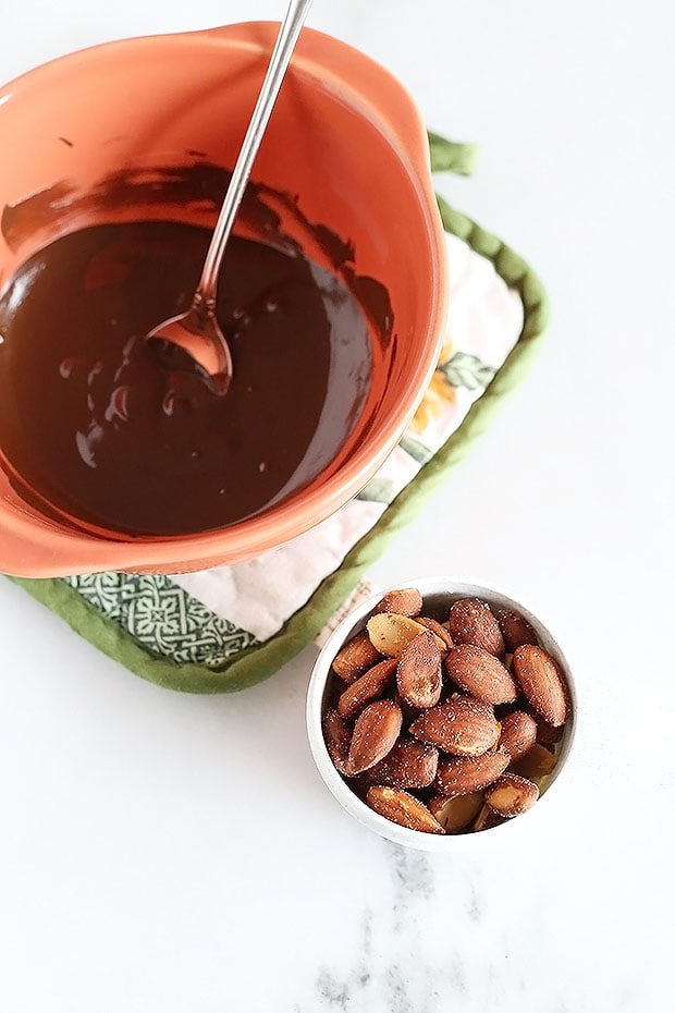 3 Ingredient Salted Chocolate Almond Clusters are super quick and easy to make, and perfect to have on hand for a healthier treat or chocolate craving! Crunchy, sweet and salty! Vegan and Gluten Free. / TwoRaspberries.com