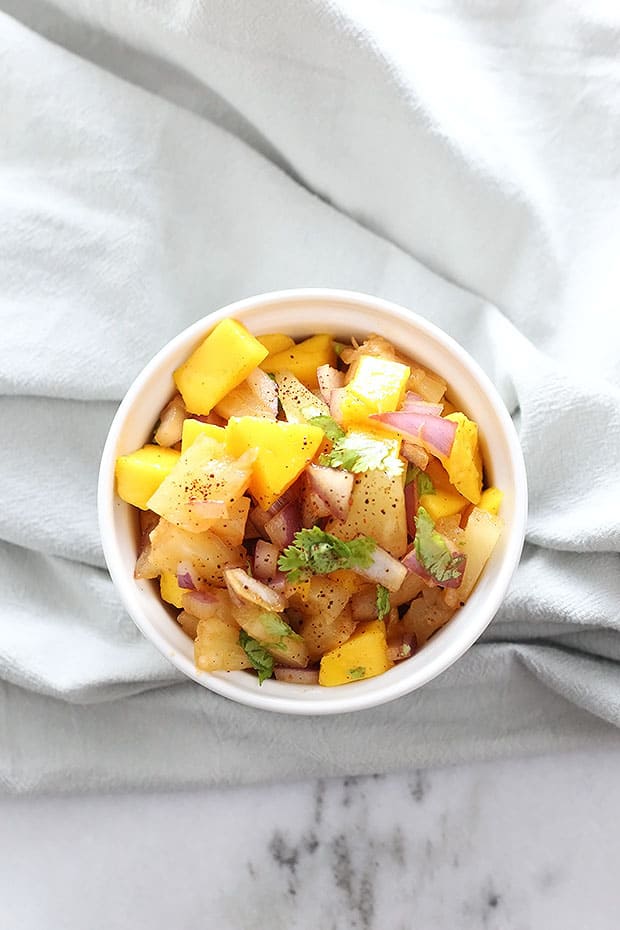 Chili Pineapple Mango Salsa! Super quick and easy to make. Healthy and a great switch from regular salsa! Vegan and Gluten Free! / TwoRaspberries.com