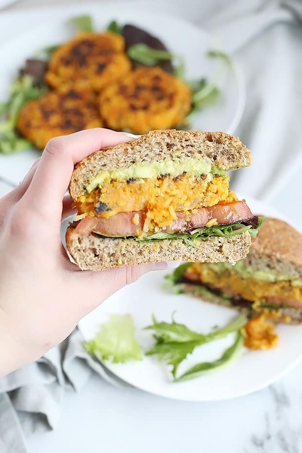 These Healthy Vegan Curry Burgers full of spicy flavor! Made with sweet potatoes, rice, mushrooms and onion along with spices make this a delicious flavorful burger! Vegan and Gluten Free! / TwoRaspberries.com