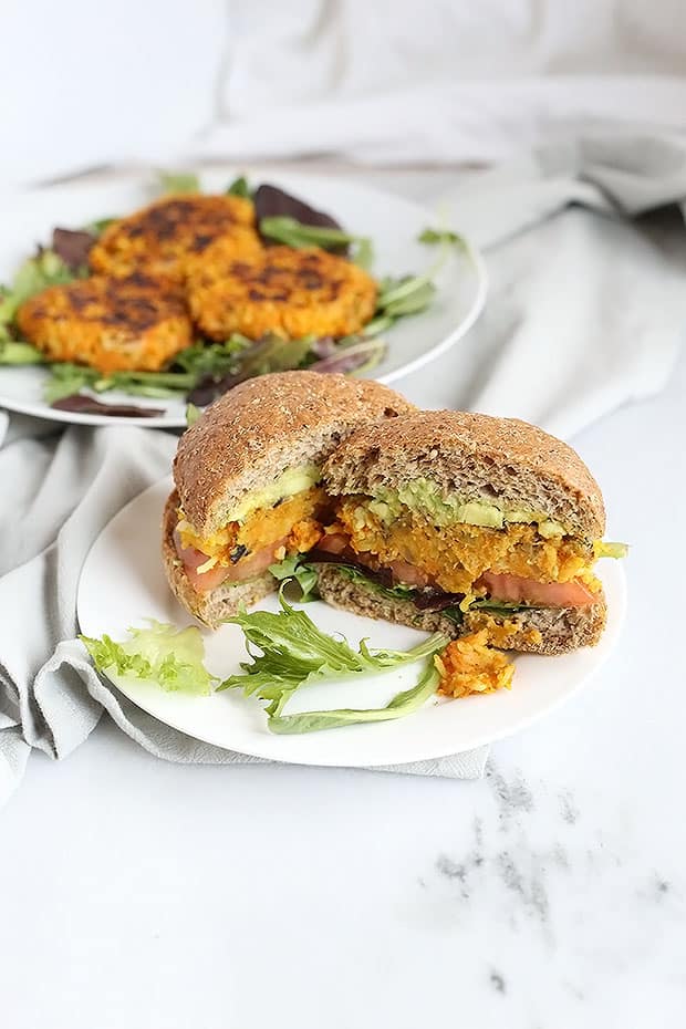 These Healthy Vegan Curry Burgers full of spicy flavor! Made with sweet potatoes, rice, mushrooms and onion along with spices make this a delicious flavorful burger! Vegan and Gluten Free! / TwoRaspberries.com