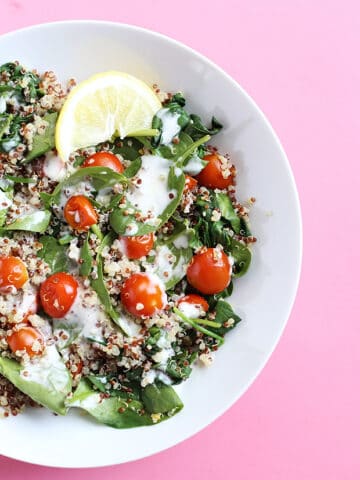 This 5 Ingredient Tomato Spinach Quinoa Salad is healthy and light, great for lunch and ready in less than 30 minutes! Vegan and Gluten Free! / TwoRaspberries.com