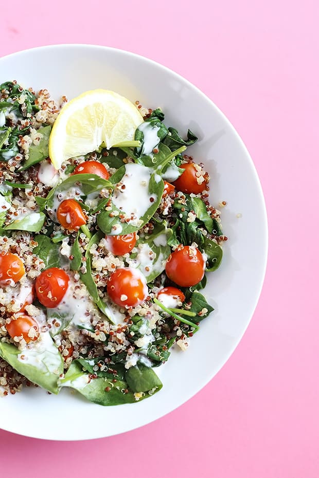 This 5 Ingredient Tomato Spinach Quinoa Salad is healthy and light, great for lunch and ready in less than 30 minutes! Vegan and Gluten Free! / TwoRaspberries.com