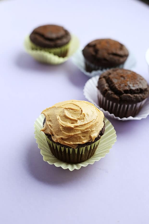 Healthy Vegan Gluten Free Chocolate Cupcakes. Light and moist. Quick and easy to make, only 10 ingredients vegan, gluten free, and refined sugar free! / TwoRaspberries.com