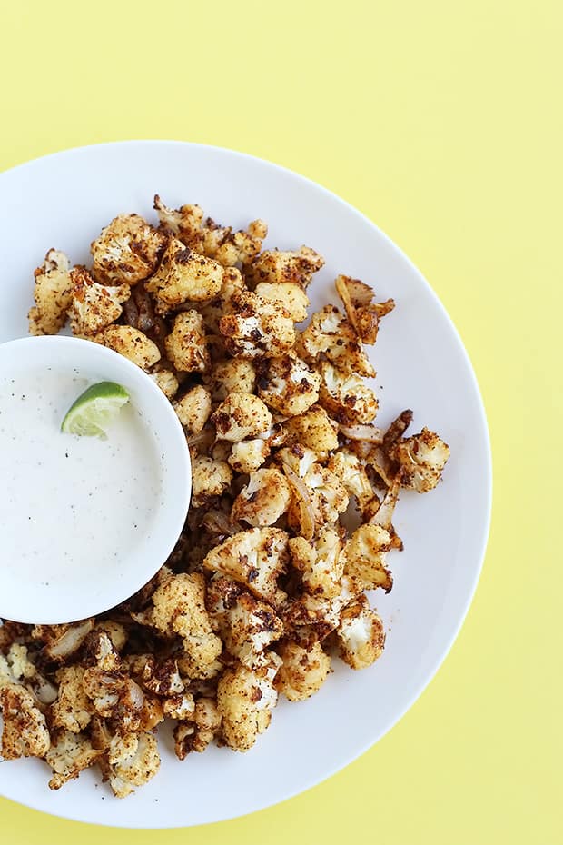  Spicy Roasted Cauliflower paired with a lime dipping sauce is perfect for an appetizer or side dish, and quick and easy to make. Vegan and Gluten Free. / TwoRaspberries.com