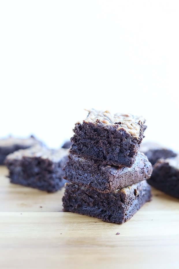 These Vegan Gluten Free Caramel Brownies are super dense and moist. Refined sugar free, naturally sweetened with maple syrup and applesauce! / TwoRaspberries.com