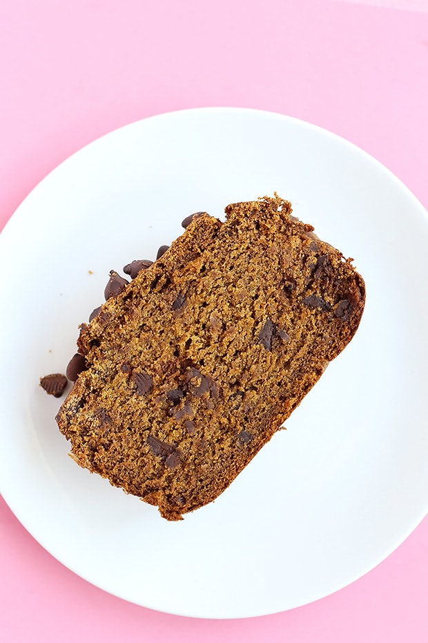 This Vegan Gluten Free Pumpkin Spice Bread is moist, soft and delicious! Chocolate chips are added for extra sweet-ness in this bread! / TwoRaspberries.com