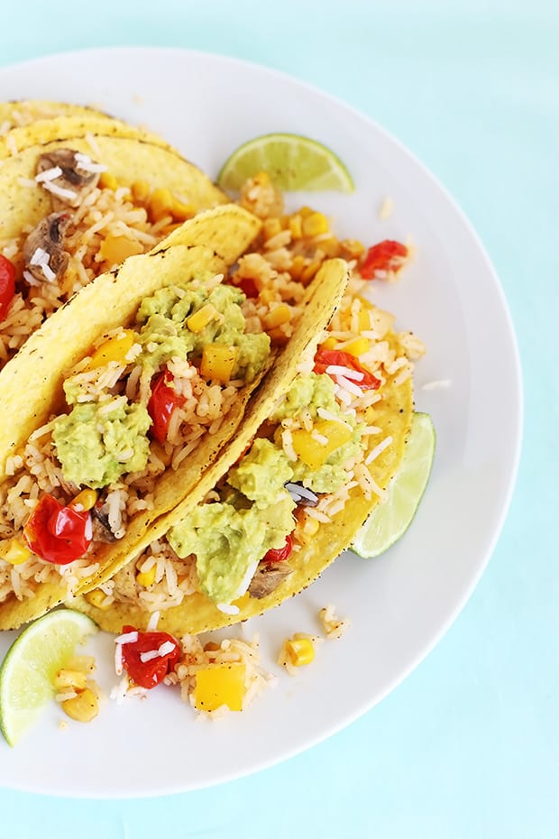  Chili Lime Rice Tacos are fresh with a little spice! Stuffed with Corn, mushrooms, pepper and tomatoes. Easy, vegan , gluten free, low fat, oil free! / TwoRaspberries.com