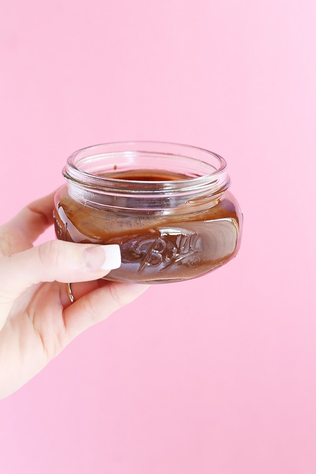  Healthy Chocolate Date Sauce is a naturally sweet indulgent chocolate sauce, for topping on nice cream, dipping fruit, or anything else! Only 3 ingredients! / TwoRaspberries.com