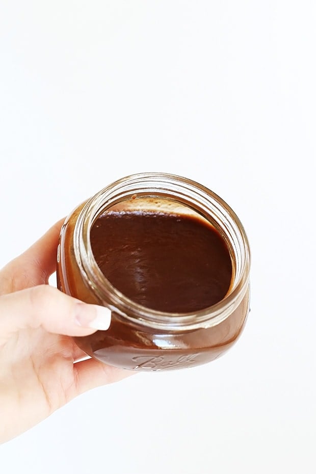  Healthy Chocolate Date Sauce is a naturally sweet indulgent chocolate sauce, for topping on nice cream, dipping fruit, or anything else! Only 3 ingredients! / TwoRaspberries.com