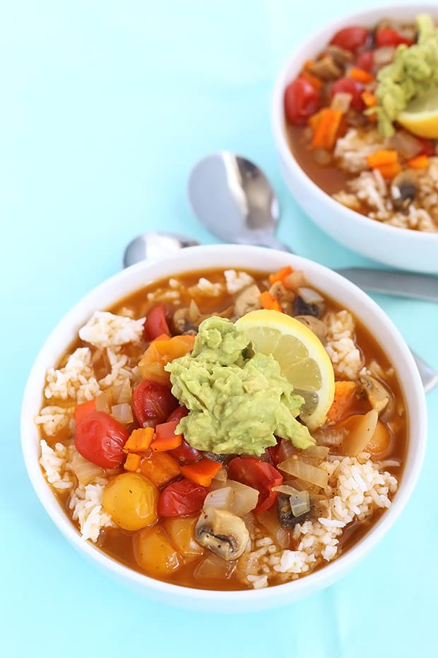  Mushroom Veggie Rice Soup is a warm and comforting dish that’s really easy to make. It is oil free and low sodium, vegan and gluten free! / TwoRaspberries.com