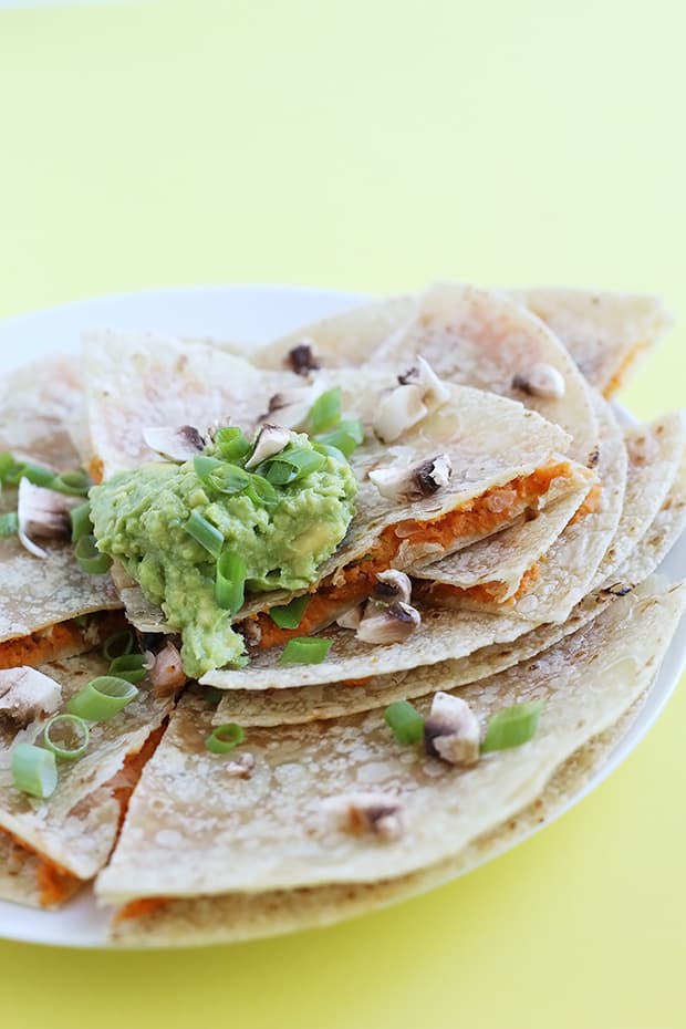 Healthy Sweet Potato Quesadillas are flavored with chili powder, mushrooms and scallions. Super simple to make, low fat, vegan and gluten free! / TwoRaspberries.com