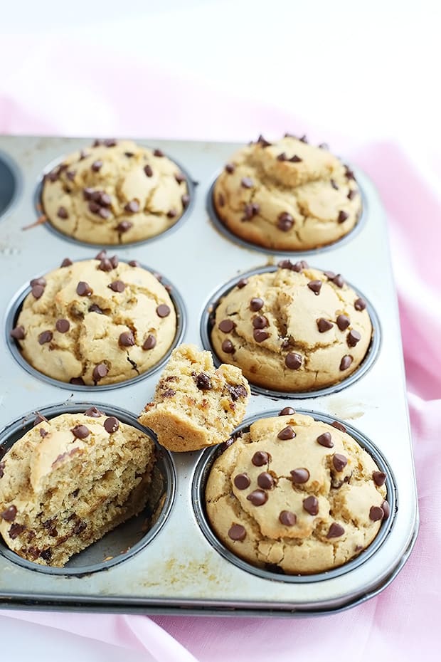 These Vegan Gluten Free Chocolate Chip Peanut Butter Muffins are super quick and easy to make. Light, fluffy, and moist textured. / TwoRaspberries.com