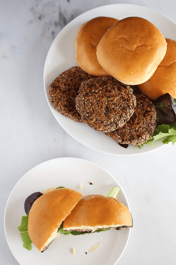 These Healthy Black Bean Quinoa Burgers are super easy to make! They are made with quinoa, oats, onions mushrooms and black beans! Vegan and GF! | TwoRaspberries.com