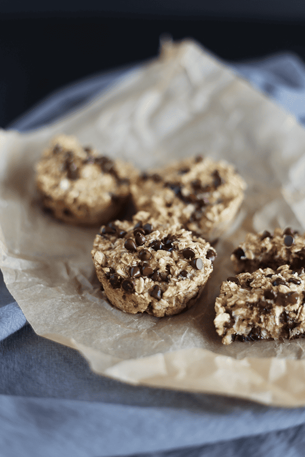 These Banana Bread Breakfast Muffins are super healthy! Made with Oats and sweetened with maple syrup and chocolate chips! Vegan and Gluten Free! | TwoRaspberries.com