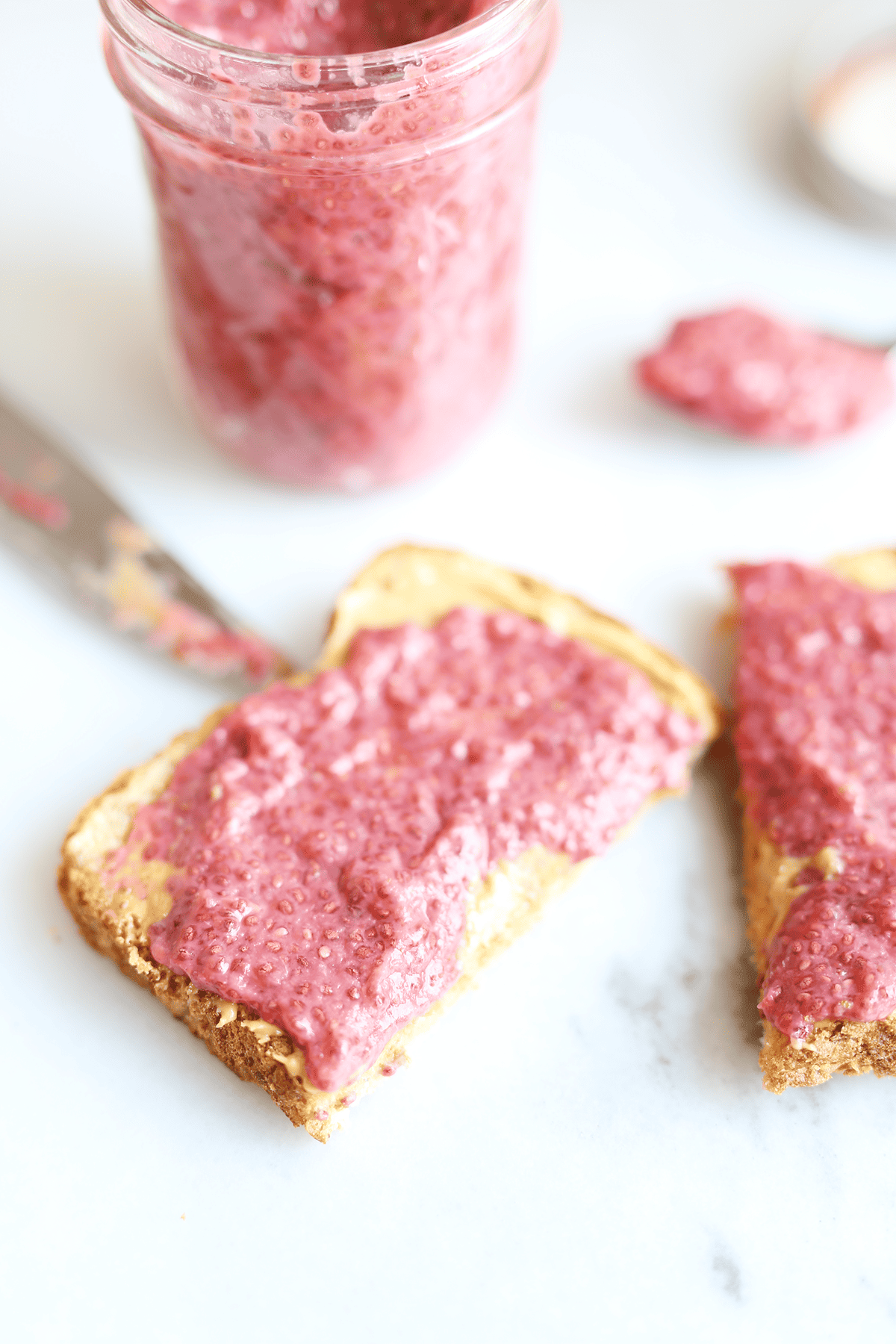This Strawberry Chia Jam is SUPER easy to make, only requires 3 ingredients, naturally sweetened and wayyy healthier than star bought jams.