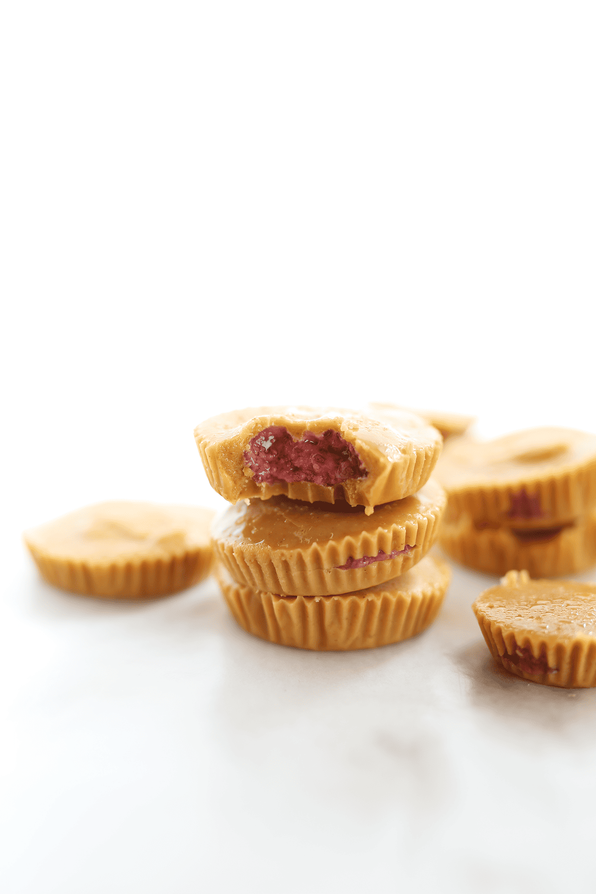 Peanut Butter and Jelly Cups are super sweet and indulgently rich and creamy! Reminiscent of a classic, the PB&J sandwich! Vegan and healthy-ish! 