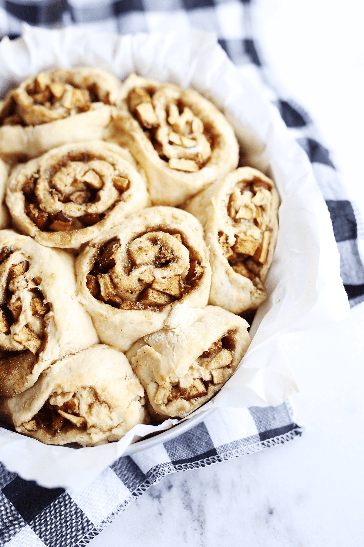 These easy Apple Spice Rolls taste just like a homemade apple pie wrapped in a super soft and perfectly doughy roll. Vegan and super yum!