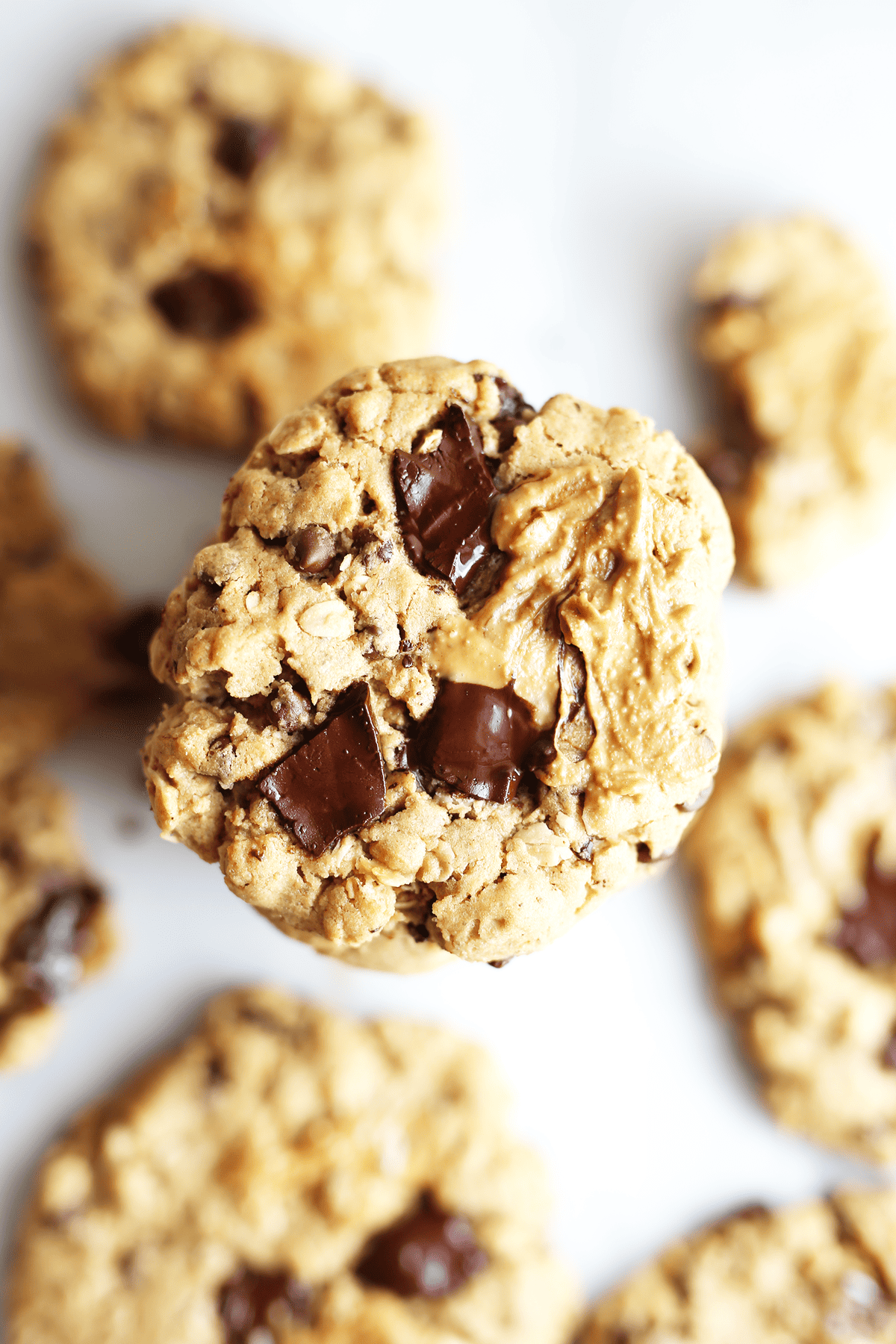 This easy homemade vegan Chocolate Chunk Peanut Butter Oat Cookie tastes like a granola bar meets peanut butter cup in the form of a delicious cookie!