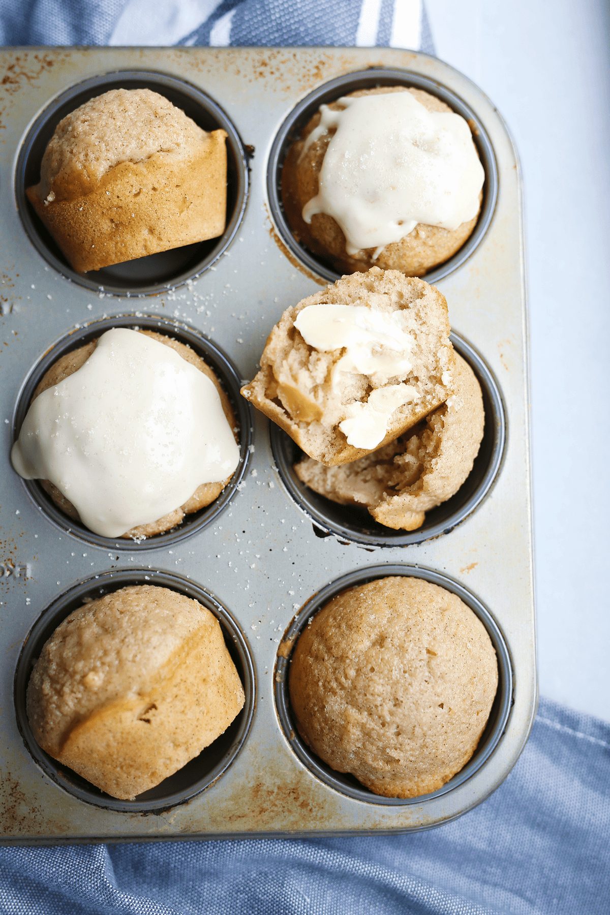These homemade Apple Cider Muffins are super easy and yum! Soft and moist inside with a sweet glaze on the top! Vegan and flavorful.