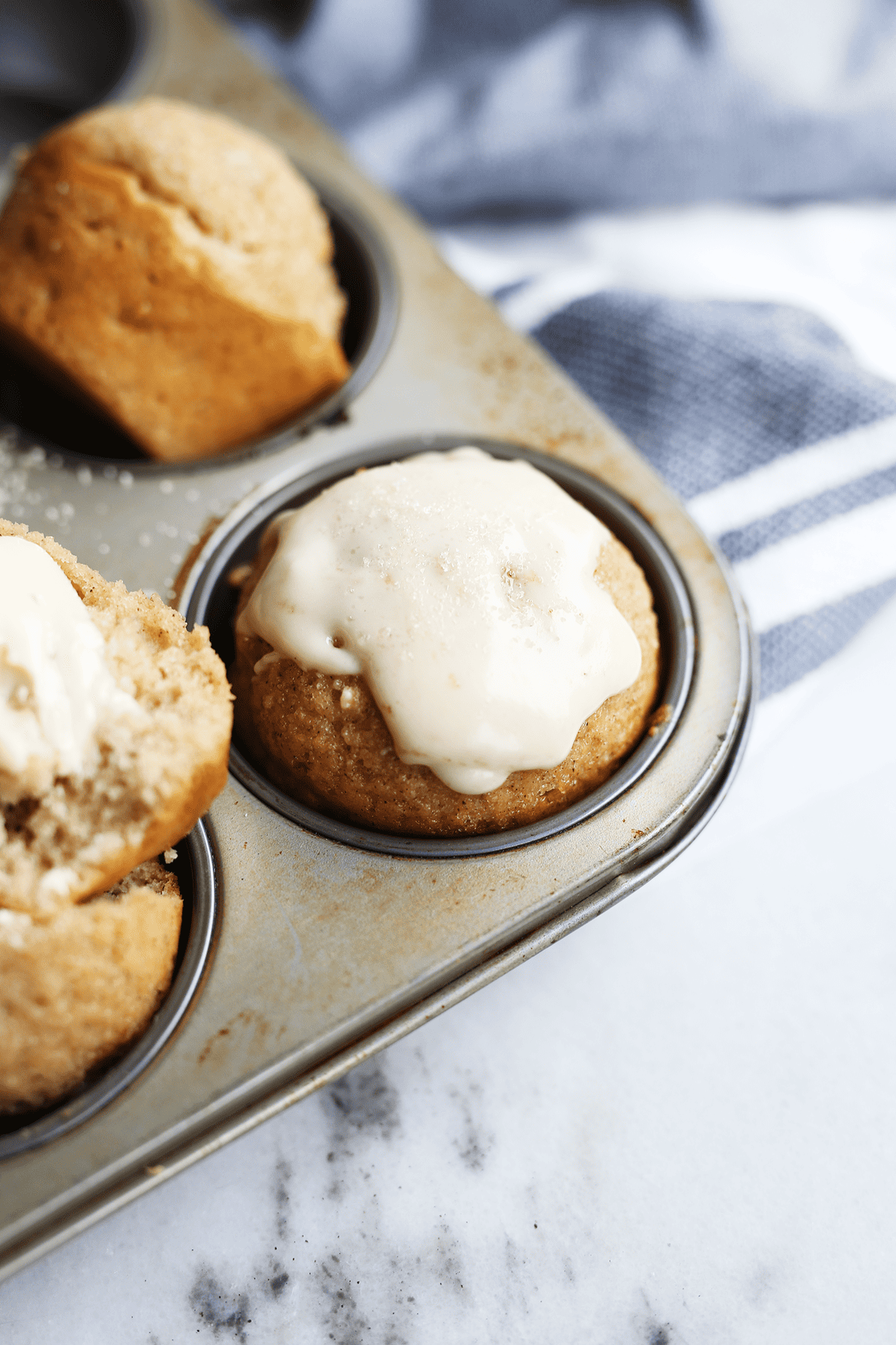 These homemade Apple Cider Muffins are super easy and yum! Soft and moist inside with a sweet glaze on the top! Vegan and flavorful.