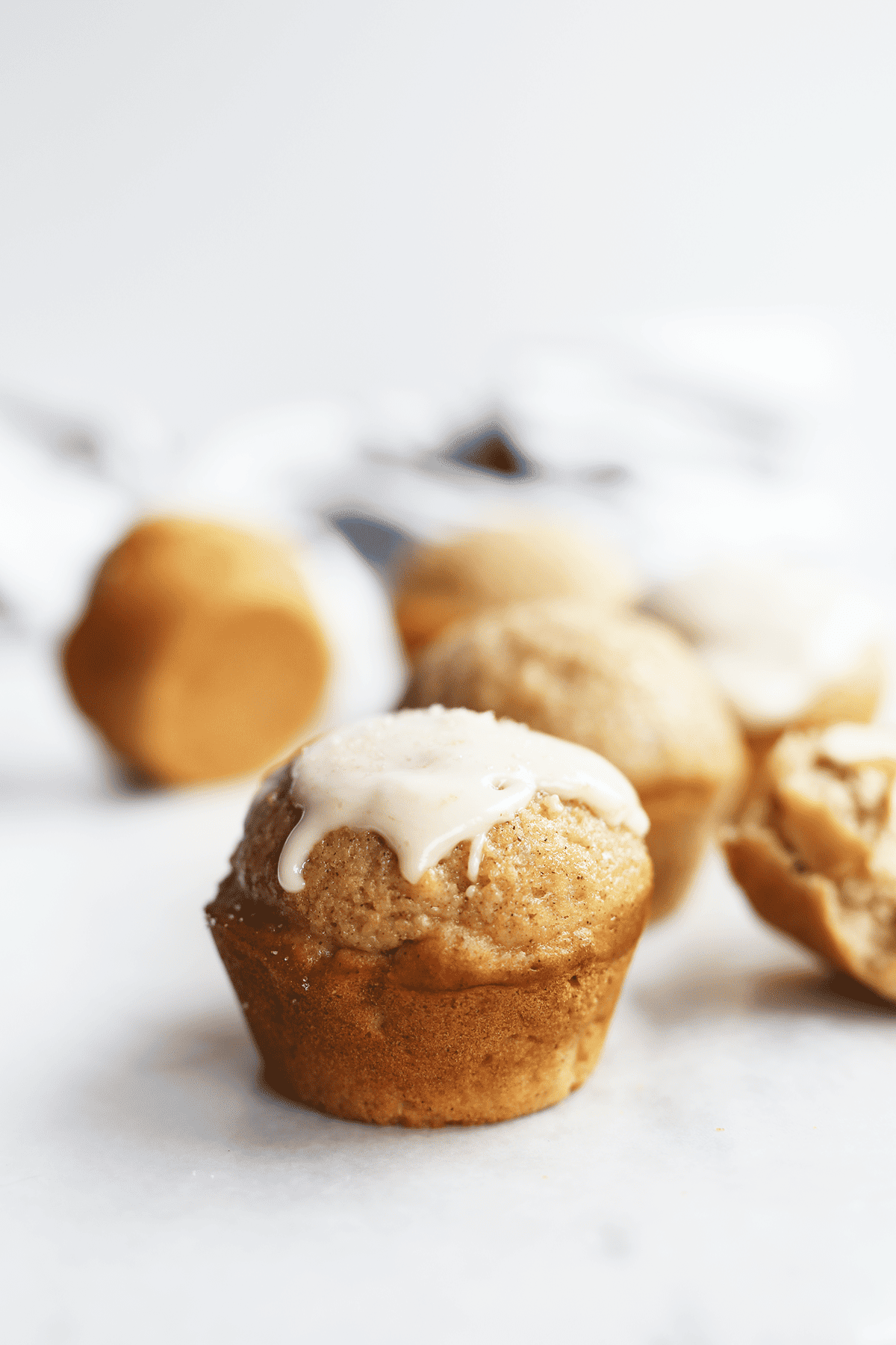 These homemade Apple Cider Muffins are super easy and yum! Soft and moist inside with a sweet glaze on the top! Vegan and flavorful.