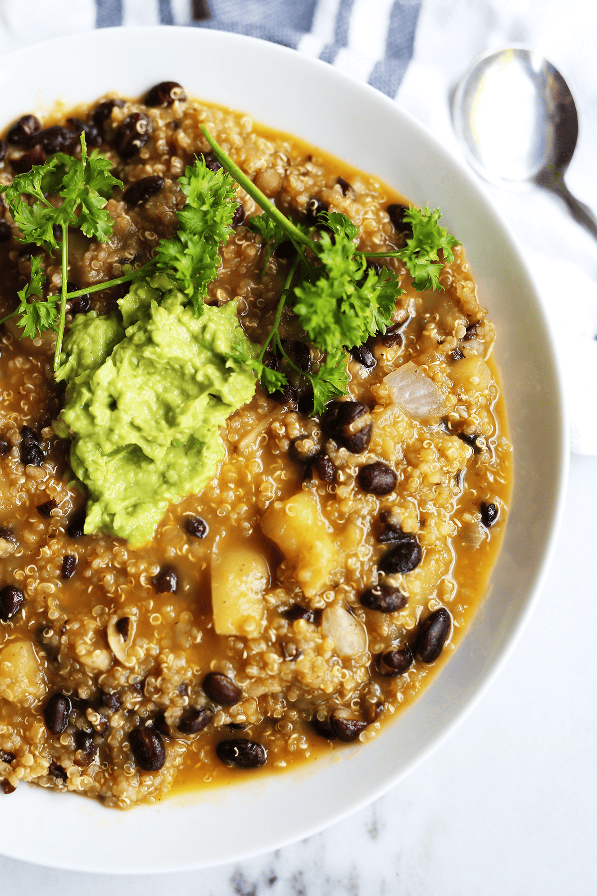 This homemade Black Bean Quinoa Soup is easy and only requires 1 pot, healthy, packed full of fresh earthy, hearty flavors and texture. Vegan and gluten free.