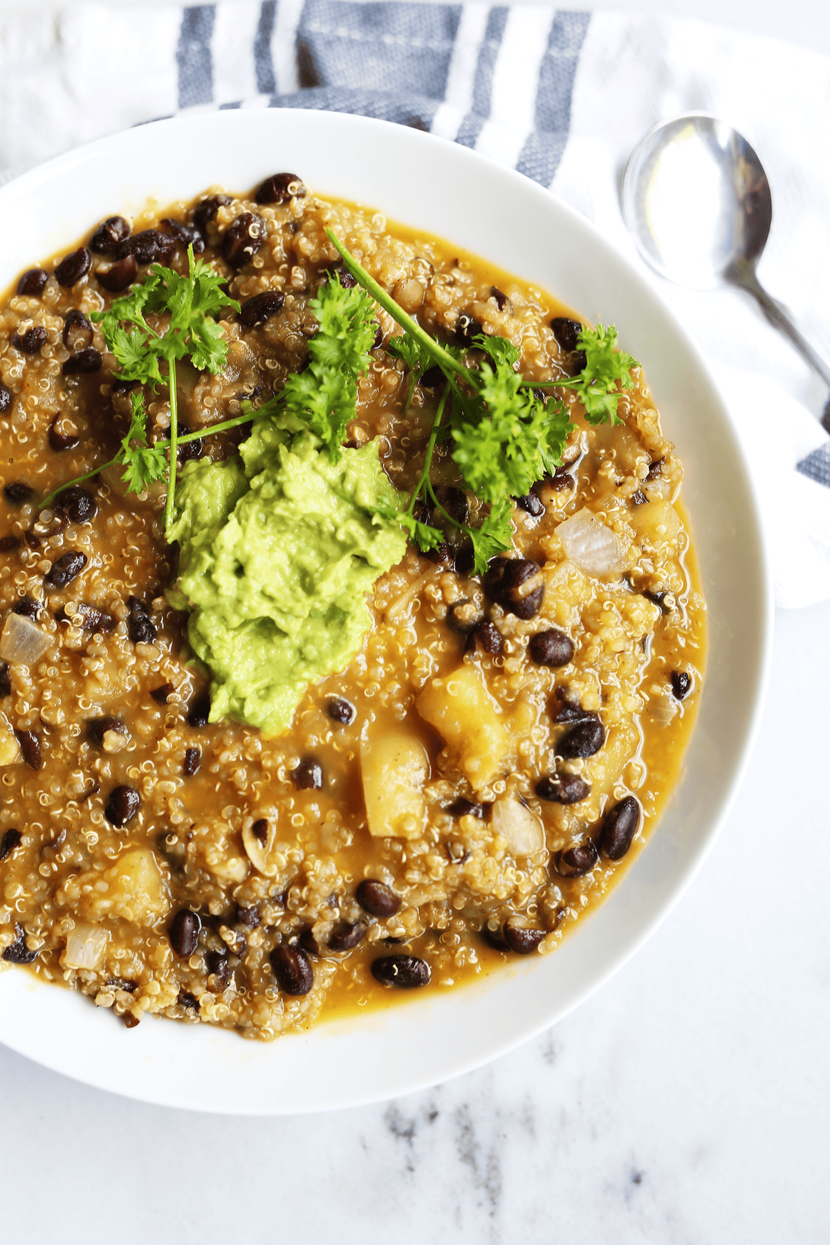 This homemade Black Bean Quinoa Soup is easy and only requires 1 pot, healthy, packed full of fresh earthy, hearty flavors and texture. Vegan and gluten free.