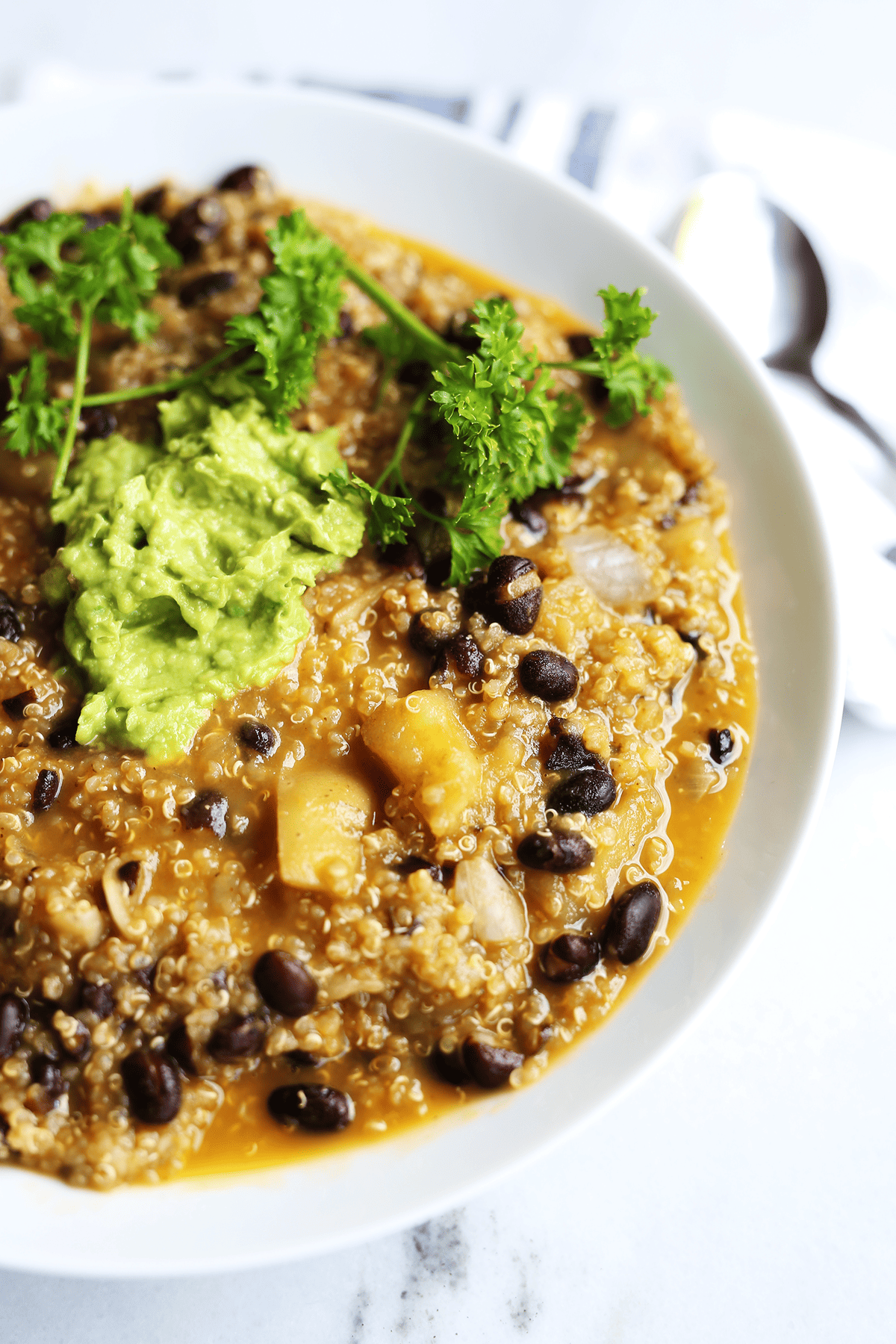 This homemade Black Bean Quinoa Soup is easy and only requires 1 pot, healthy, packed full of fresh earthy, hearty flavors and texture. Vegan and gluten free.