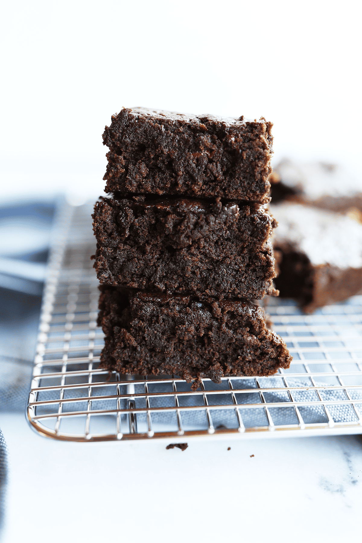 These Cake Brownies are super moist and gooey just like a brownie but light in texture like a chocolate cake! Easy to make and vegan.