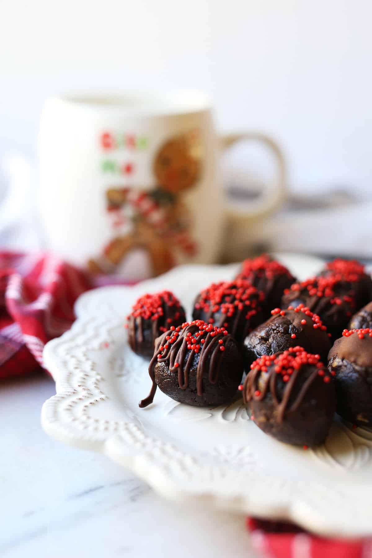 These Chocolate Fudge Truffles are healthy and you would never even know! Vegan and gluten free, gooey and rich, indulgent without the guilt! 