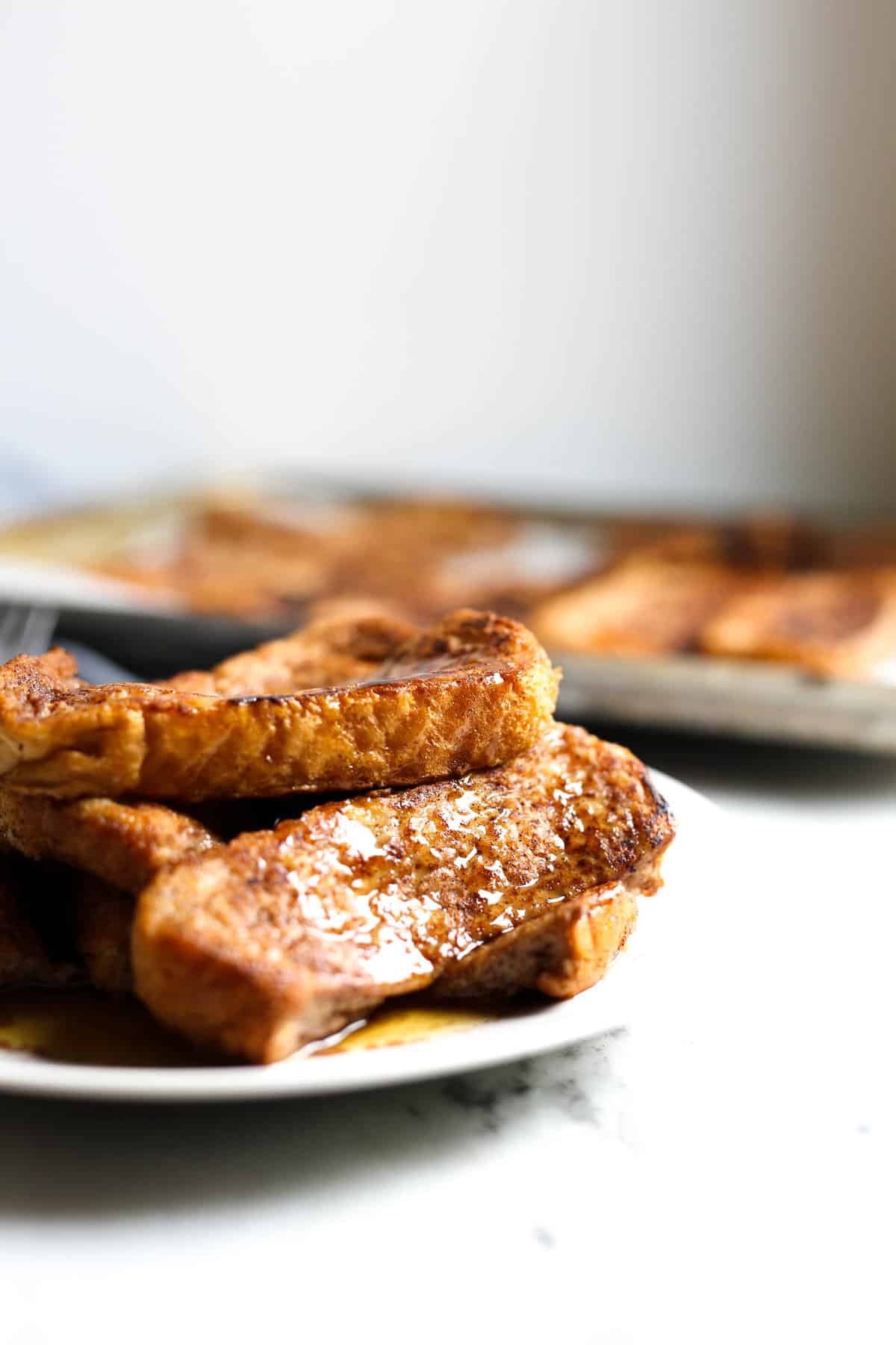 These homemade VEGAN French Toast Sticks are super quick, easy and healthy to make! Cinnamon flavored and totally yummy! no bananas or weird ingredients!