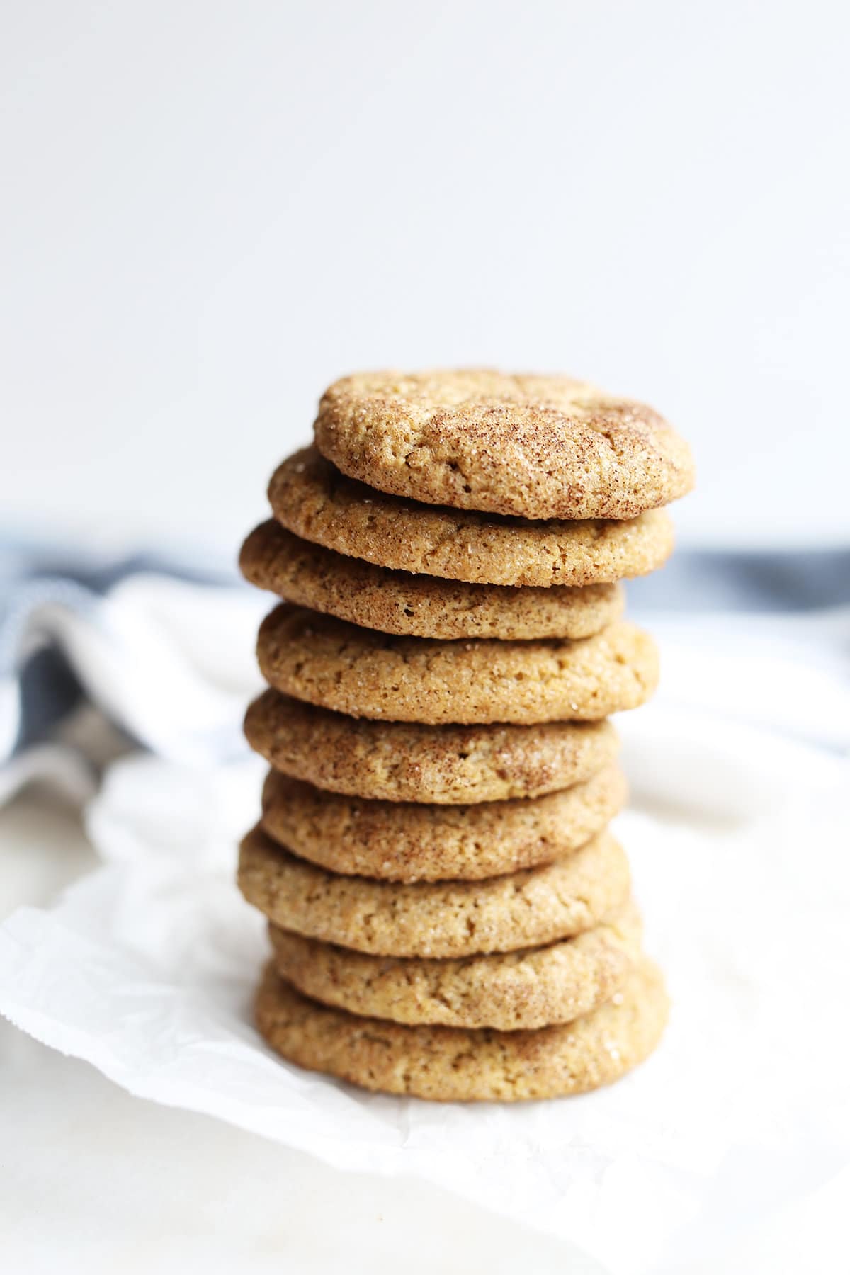 These homemade vegan Snickerdoodle Cookies are the best and super easy to make! Sweet, sugar and cinnamon form this chewy cookie. 