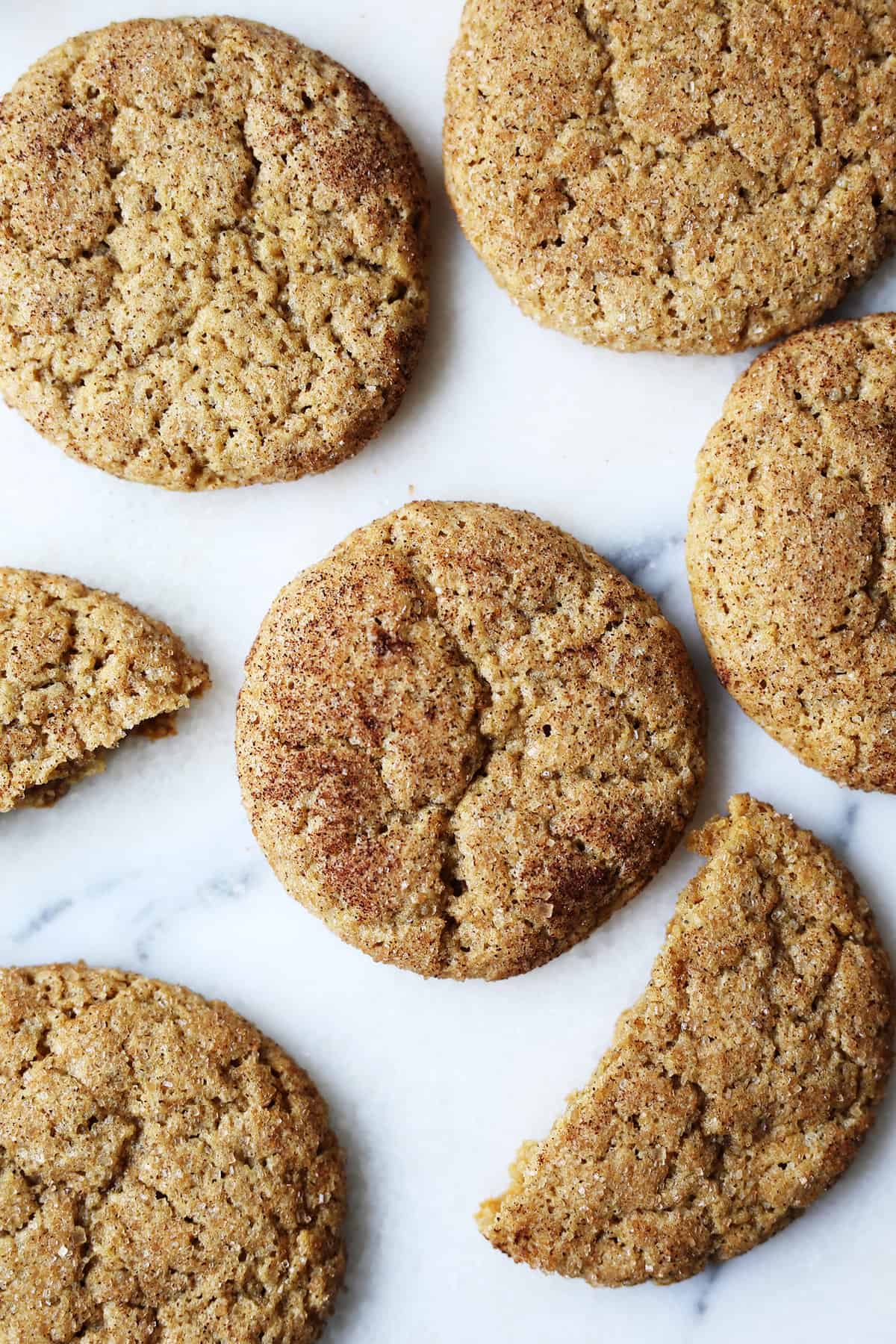 These homemade vegan Snickerdoodle Cookies are the best and super easy to make! Sweet, sugar and cinnamon form this chewy cookie. 