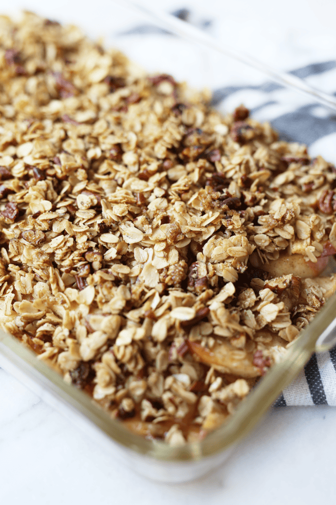This is the BEST Apple Crumble recipe ever! Tender sweet apples topped with pecan oatmeal cookie crumble topping,easy and the perfect baked fall dessert.