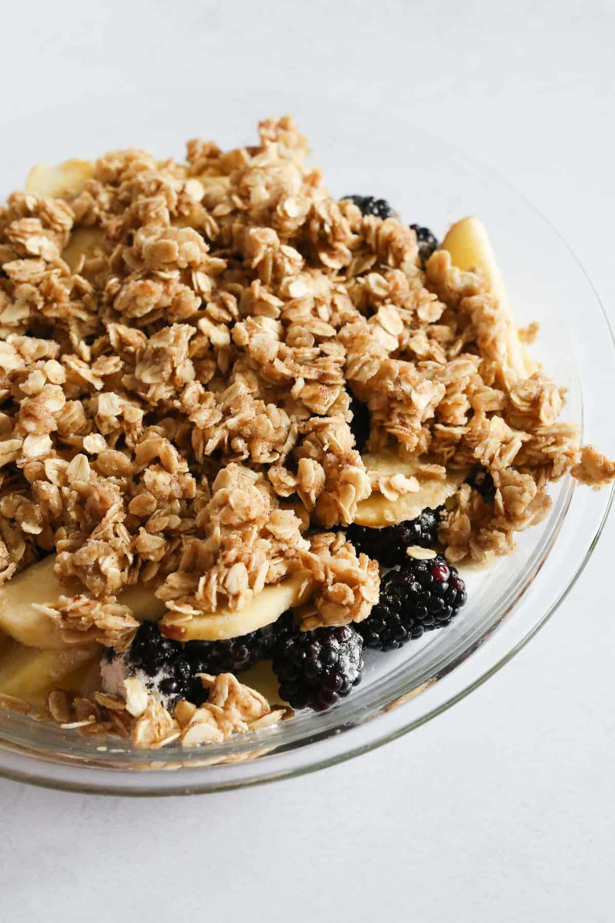 Crumble in pie dish. ready to be baked.