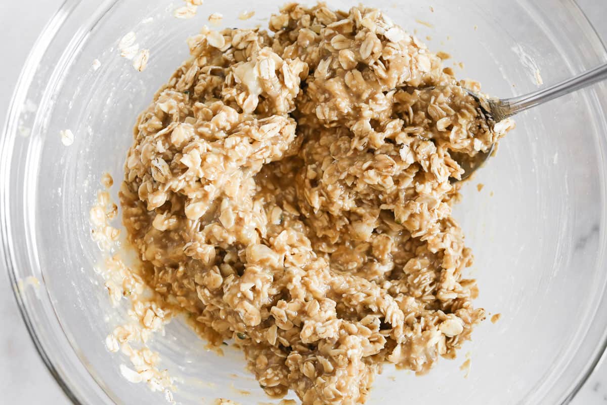 Banana Peanut Butter Oatmeal Cookie dough in a glass bowl.