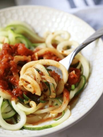 1200 x 1200 image of zucchini noodles.