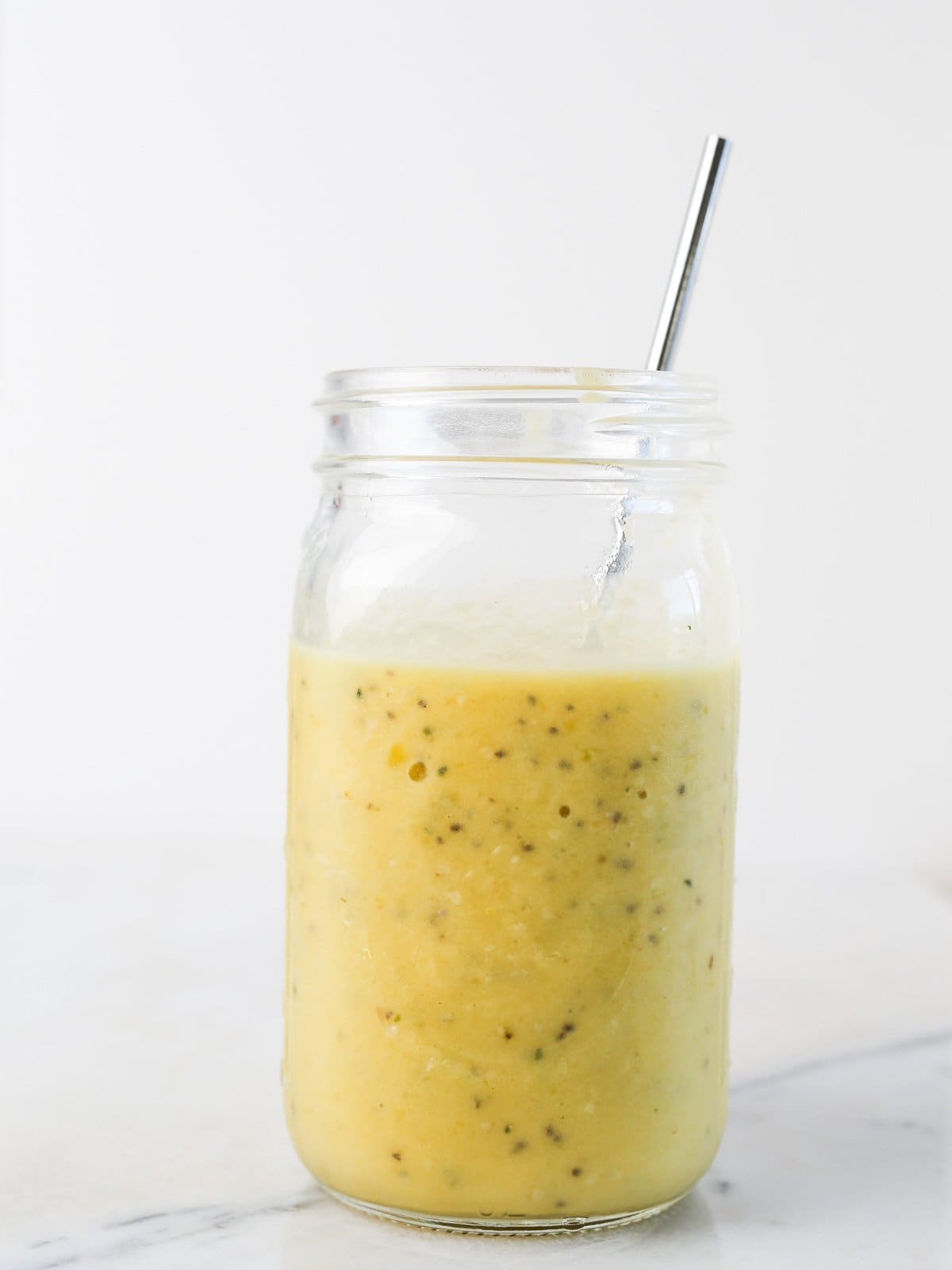 Side image of this smoothie with pineapple, mango and banana.