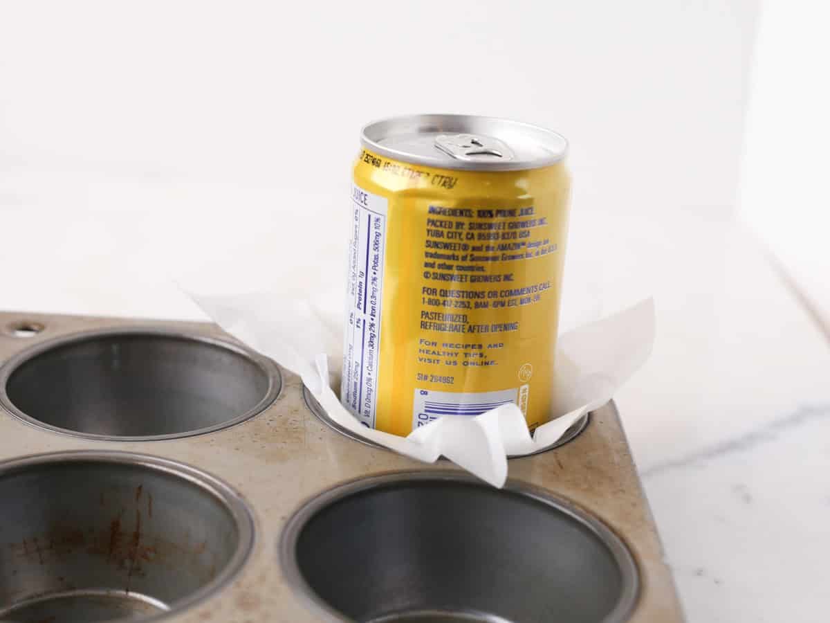 Showing how to make a parchment paper muffin liner easily.