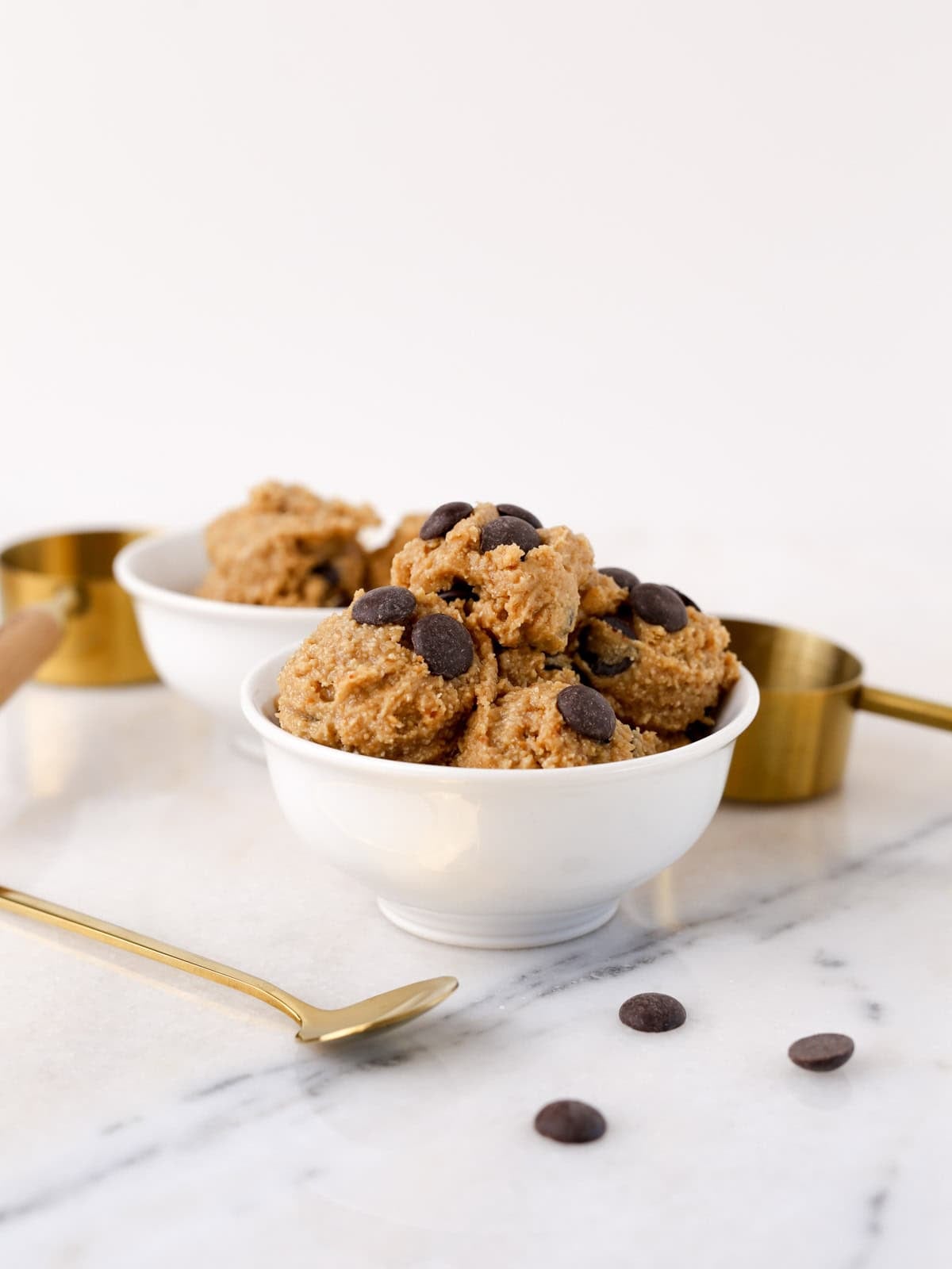 Healthy cooke dough in small white bowl.