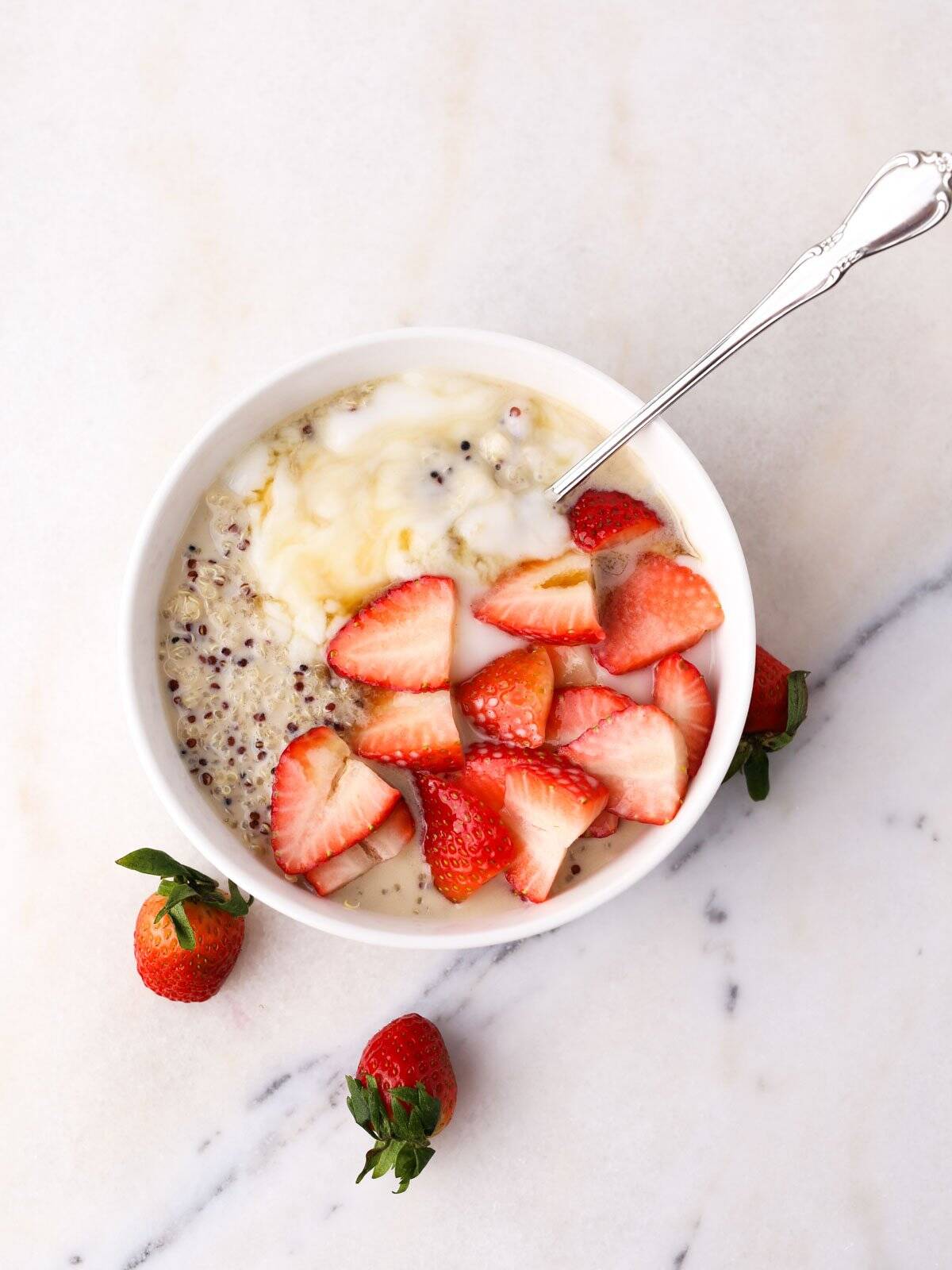 Marble surface on this quinoa breakfast recipe in a bowl.