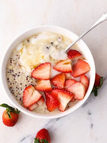 1200x1200 image of this strawberries and cream quinoa breakfast bowl.