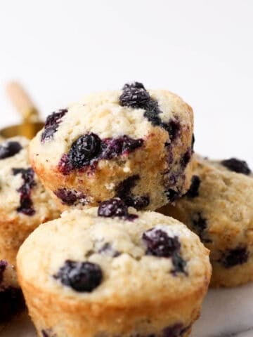 1200x1200 image of dairy free vegan blueberry muffins.