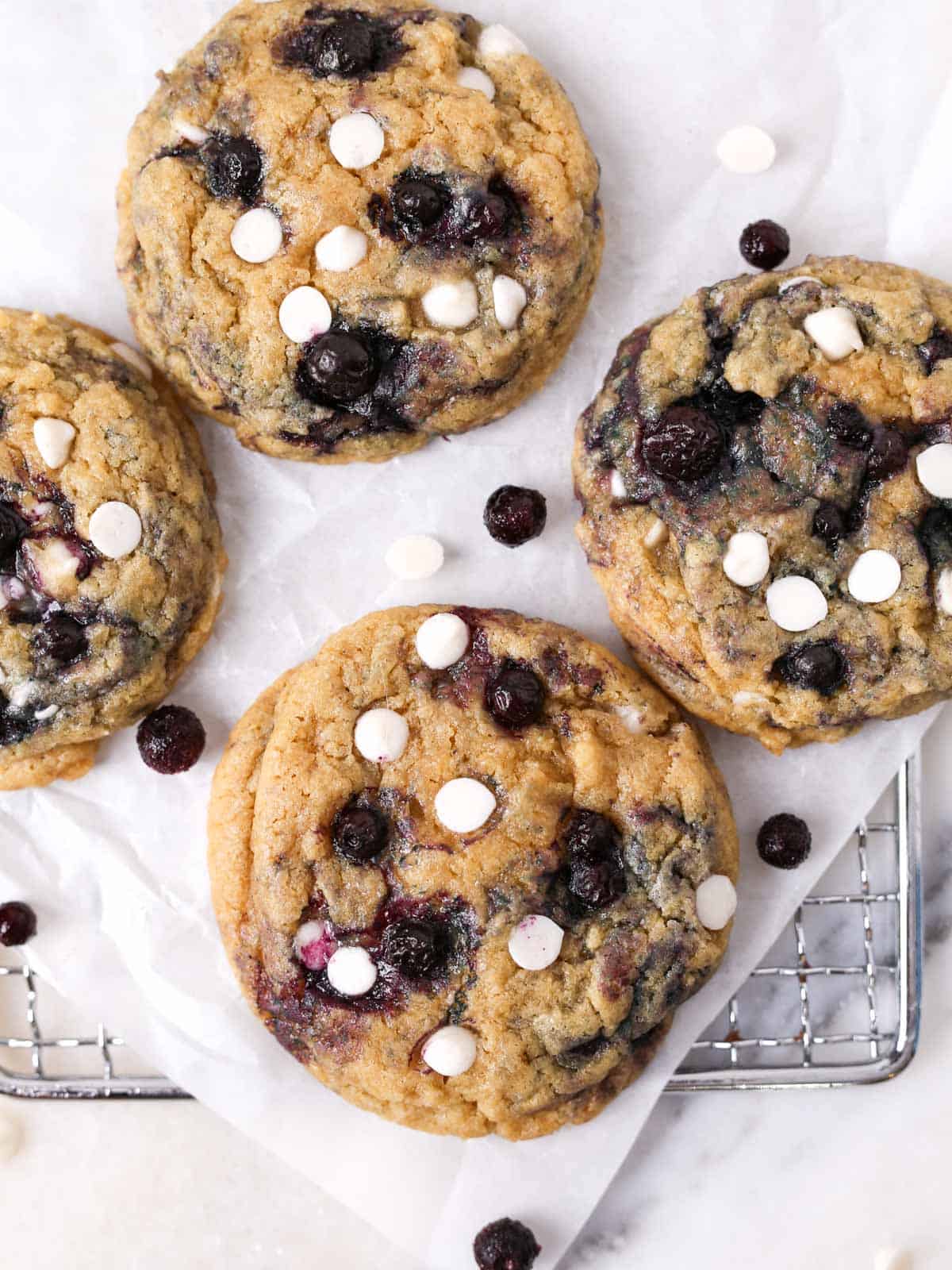 Overhead image of blueberry and white chocolate cookies.