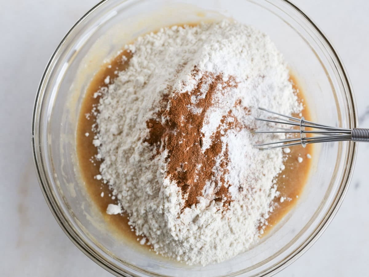 Dry ingredients added to wet ingredients.